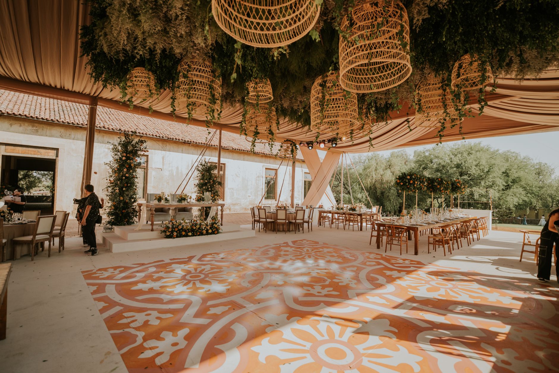 Captivating outdoor wedding venue with elegant floral decorations and wooden seating setup. — Spielbank Hohensyburg