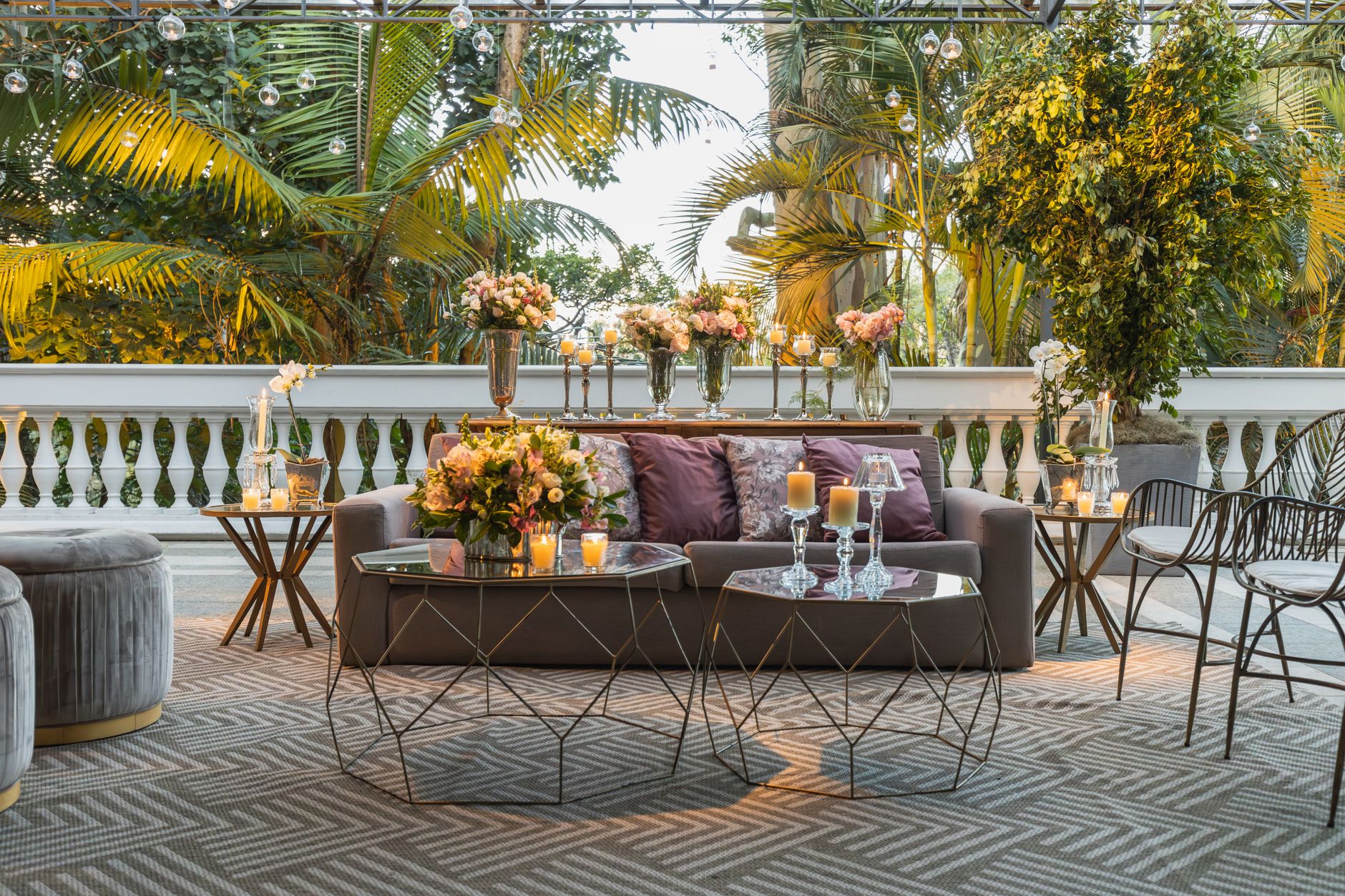 Luxurious outdoor terrace decorated with flowers, candles, and elegant furniture. — What Is Omegle? How To Defend Your Kids